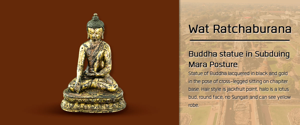 Buddha statue in Subduing Mara Posture